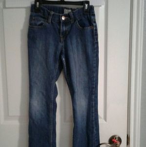 A bundle of 5 pair of children place jeans